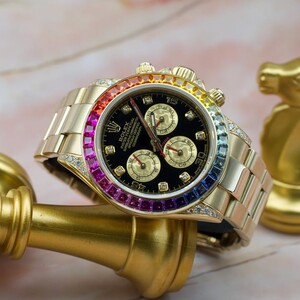 رولكس دايتونا رينبو - ذهبية اطار اللوان اوتوماتيك