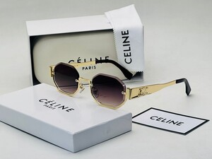 نظارة بإطار ذهبي وعدسات متدرجة زرقاء