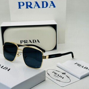 Sunglasses - Prada