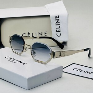 نظارة بإطار هندسي وعدسات زرقاء متدرجة