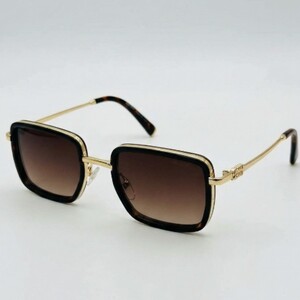 فخامة بلا حدود: نظارة أسود وذهبي بعدسات بنية