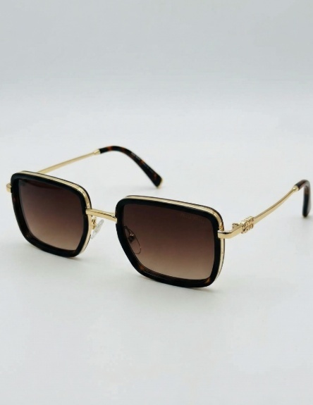 فخامة بلا حدود: نظارة أسود وذهبي بعدسات بنية